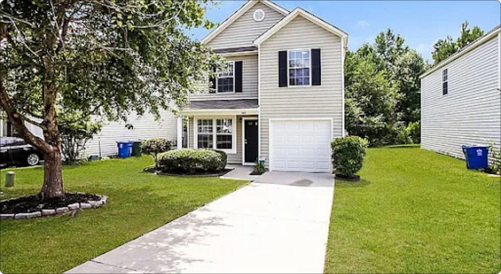 NFT Tied To Real House In South Carolina Sells For $175K Image of a white house NFT