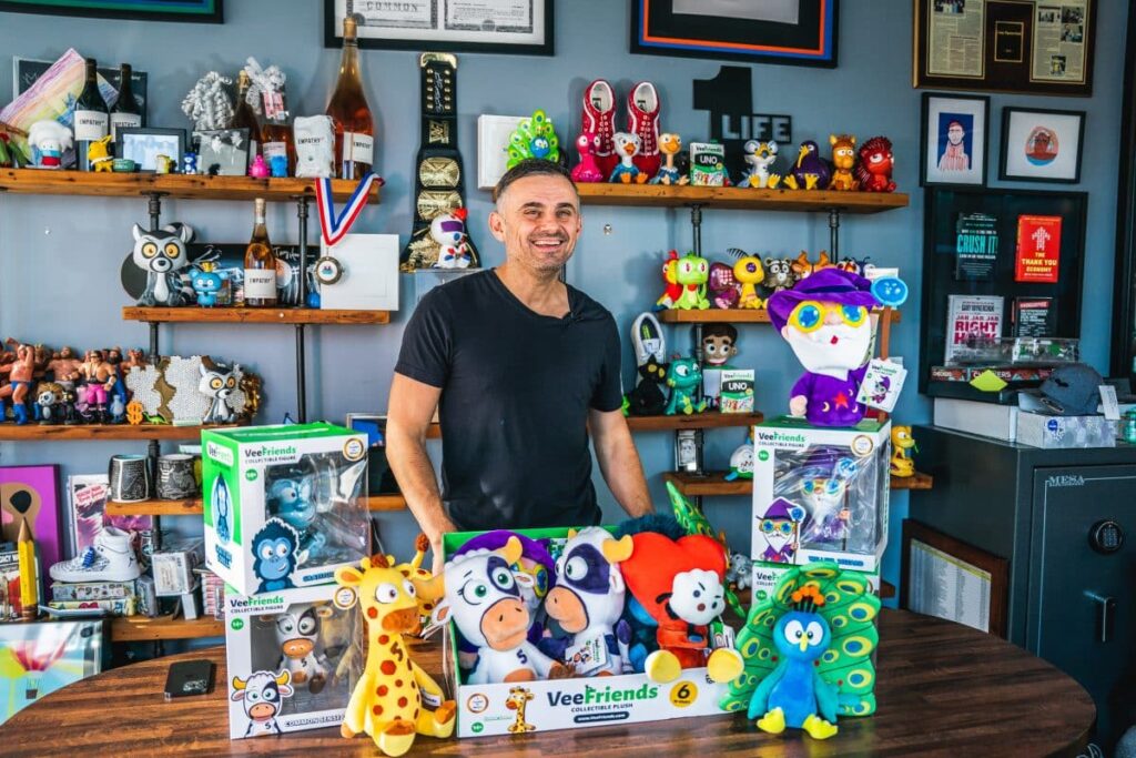 VeeFriends x Macy’s Launch Exclusive Physical Collectibles Gary Vee surrounded by VeeFriends x Macy’s plush toys